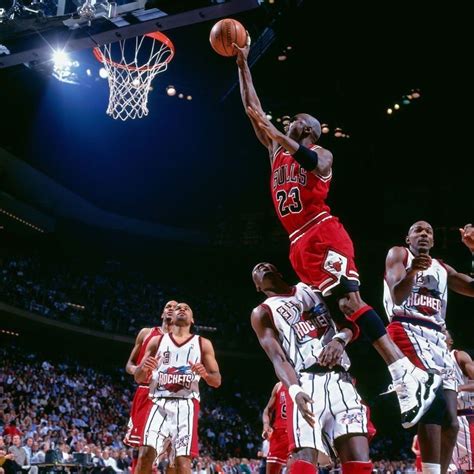 michael jordan dunking on someone.